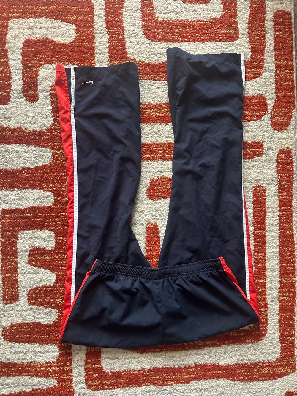 Unisex Y2K Nike Navy Track Pants with Red and white Side Stripes size small
